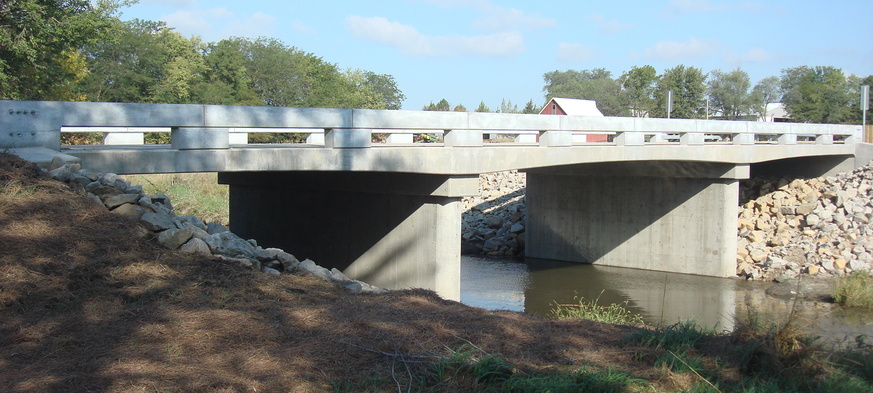 A hauched slab bridge will be replacing the steel truss bridge.